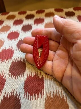 Vintage Red Carved Bakelite Fur Clip